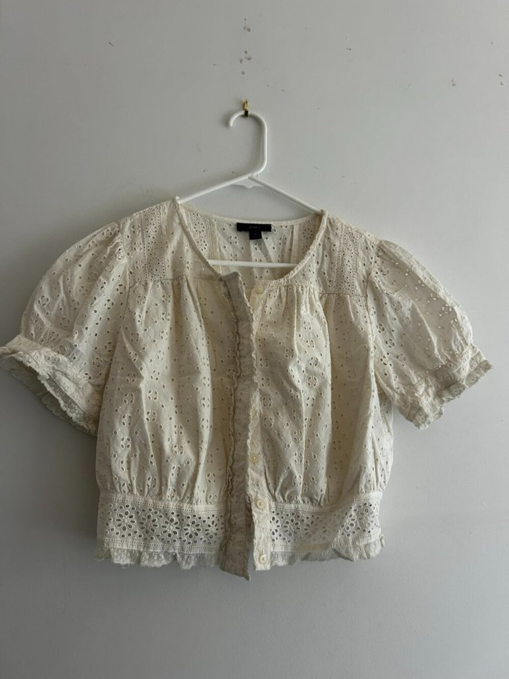 Cream-colored J.Crew button-front eyelet cropped short puff sleeve top